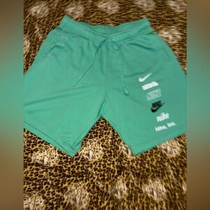 Nike Teal Shorts with Logo Accents